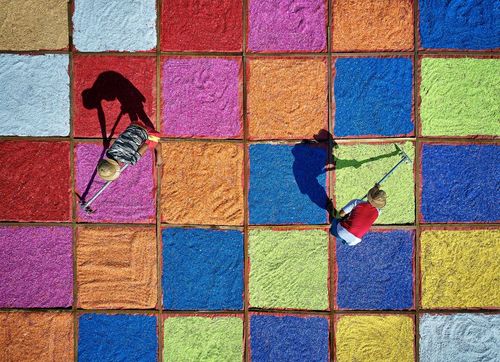 MEN AND COLORFUL PLASTIC SEEDS, YANGON, MYANMAR