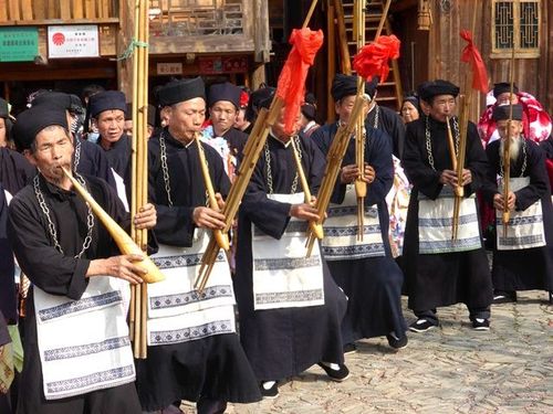 Les fameux joueurs de Sheng, dans le Guizhou, en Chine