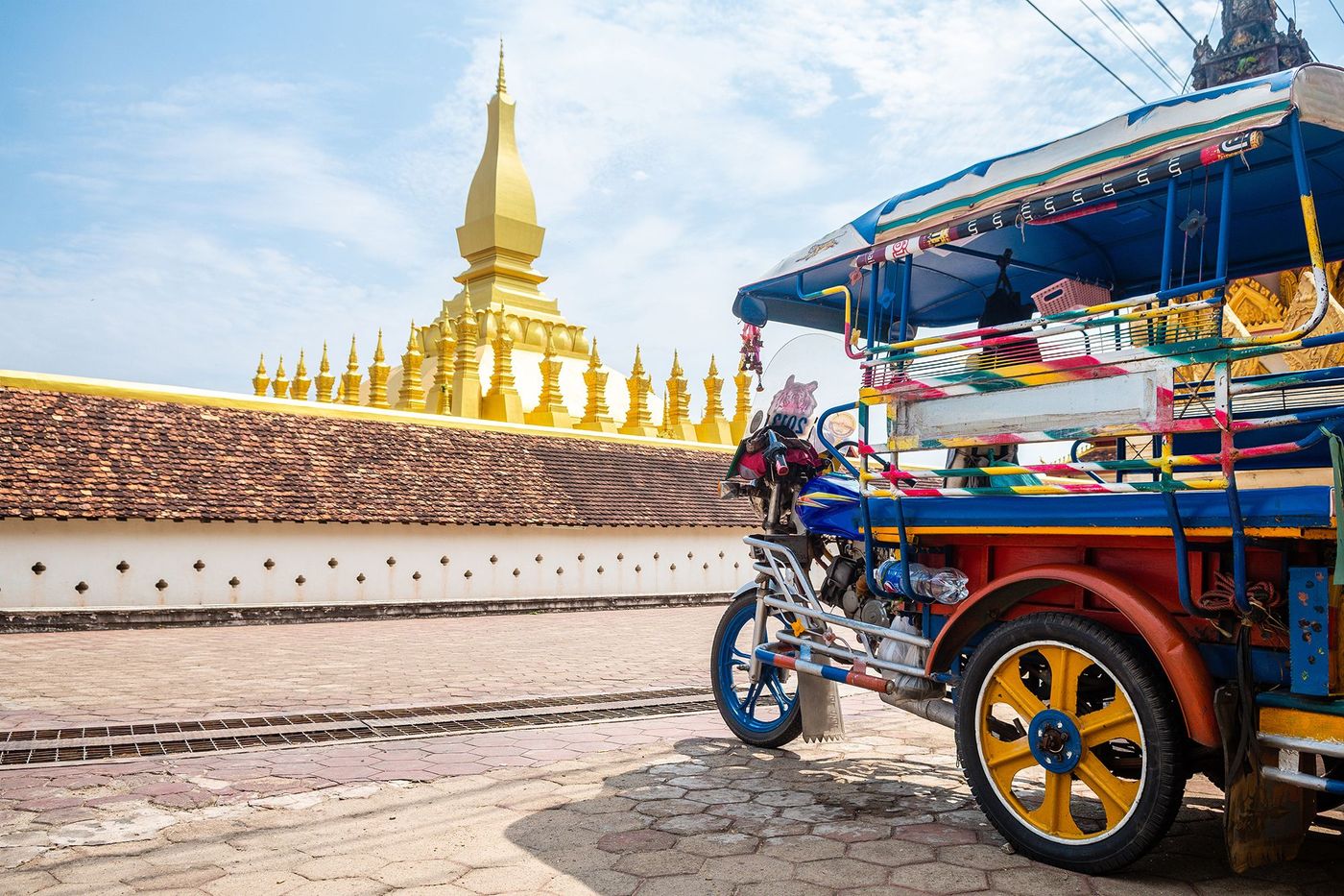 Tuk tuk - wat That Luang