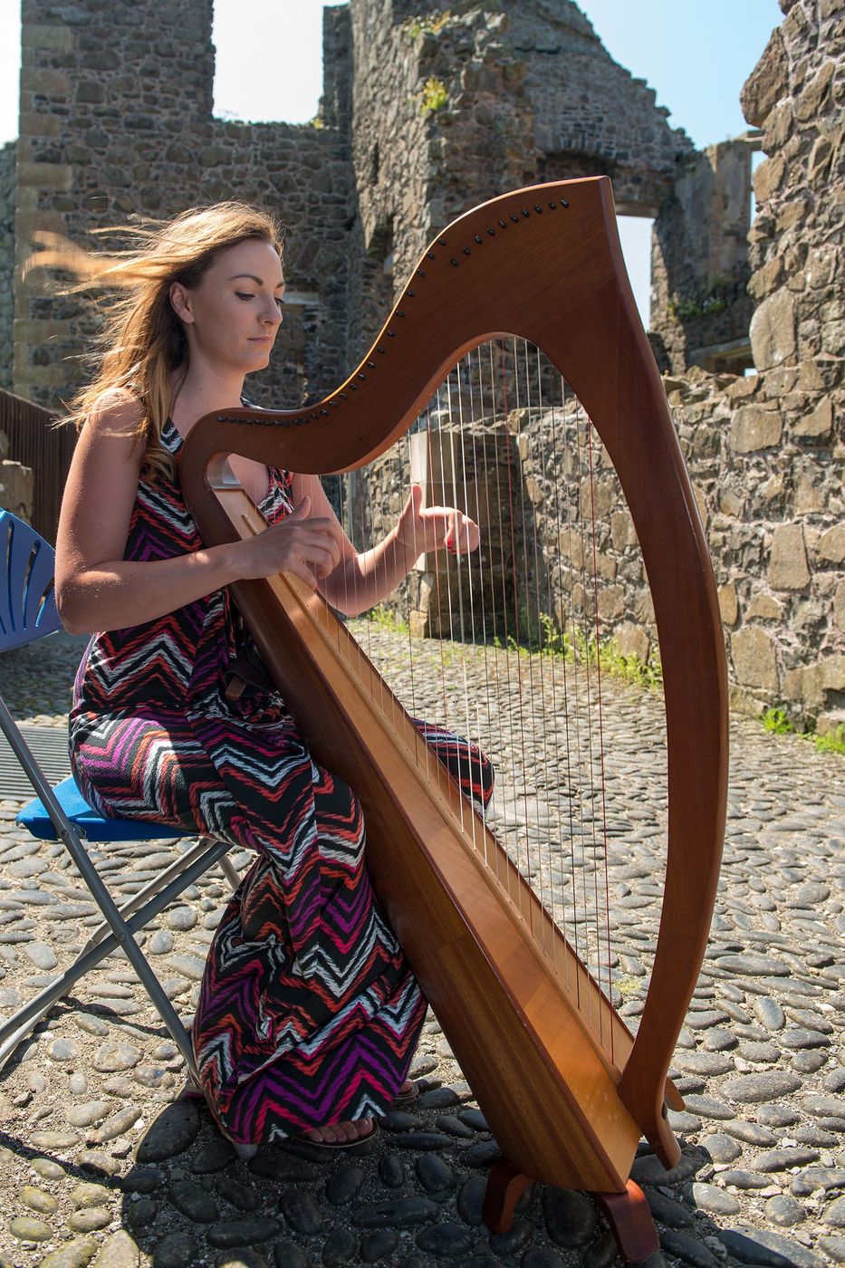 Harp player Dunluce Castle