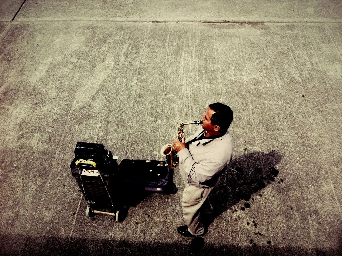 A man playing in the street