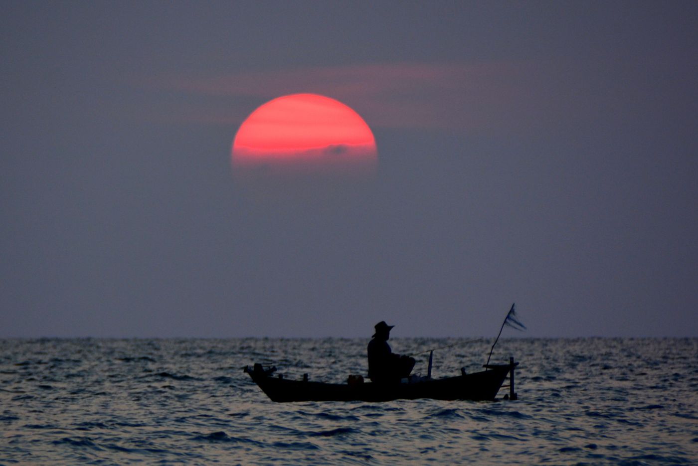 Retour de pêche au coucher de soleil